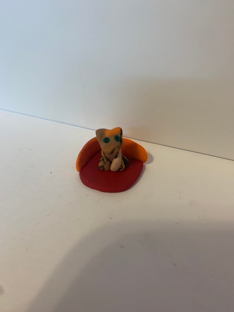 and kittens Clay cat mom dad