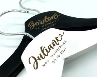 Wooden clothes hanger with personalized engraving