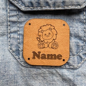 Sewing label/ Patch/ SnapPap/ Sew-on label/ Vegan leather/ Sewing/ Lion/ Patch/ Various motifs/ Children&#39;s clothing