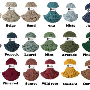 May include: A collection of 24 spools of cotton rope in various colors, including moonlight, natur, beige, sand, teal, misty, jeans, iris, light grey, steel, peacock, laurel, mint, avocado, pine green, honey, peach, blush, wine red, sunset, wild rose, mustard, and caramel.