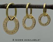 Solid brass dog tag Deep engraved Custom pet tag Personalised round ring dog tag Ten year guarantee Designed and made in the U.K