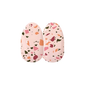 May include: Two pink nail wraps with a terrazzo pattern featuring green, red, and orange accents.