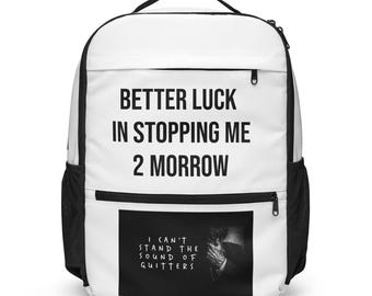 May include: A white backpack with black trim and a top handle. The front features the black text "BETTER LUCK IN STOPPING ME 2 MORROW" above a rectangular graphic containing the text "I CAN'T STAND THE SOUND OF QUITTERS" and a person's image.
