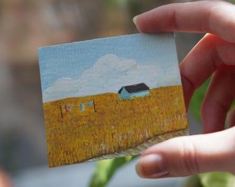 Blue house in a field Print