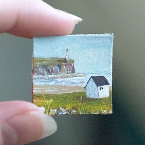 Tiny cottage by the ocean Print
