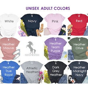 May include: A chart showing unisex adult t-shirt colors. The colors include black, white, navy, pink, red, heather deep teal, heather maroon, heather mauve, heather team purple, heather olive, heather peach, heather sunset, heather true royal, athletic heather, dark grey heather, and heather midnight navy.