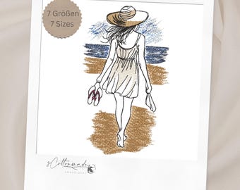 May include: An embroidered design of a person walking on a beach, wearing a sun hat and dress. The person is holding sandals and a bag. The background features the ocean and sky. The text "7 Sizes" is in a circle in the upper left corner.
