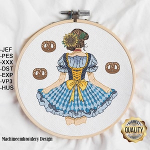 Könnte beinhalten: Maschinenstickerei-Design eines Mädchens, das ein blaues und weißes Dirndl mit einer gelben Schärpe und einem Brezel im Haar trägt. Das Design enthält drei Brezeln.
