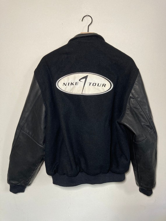 nike varsity jacket with leather sleeves