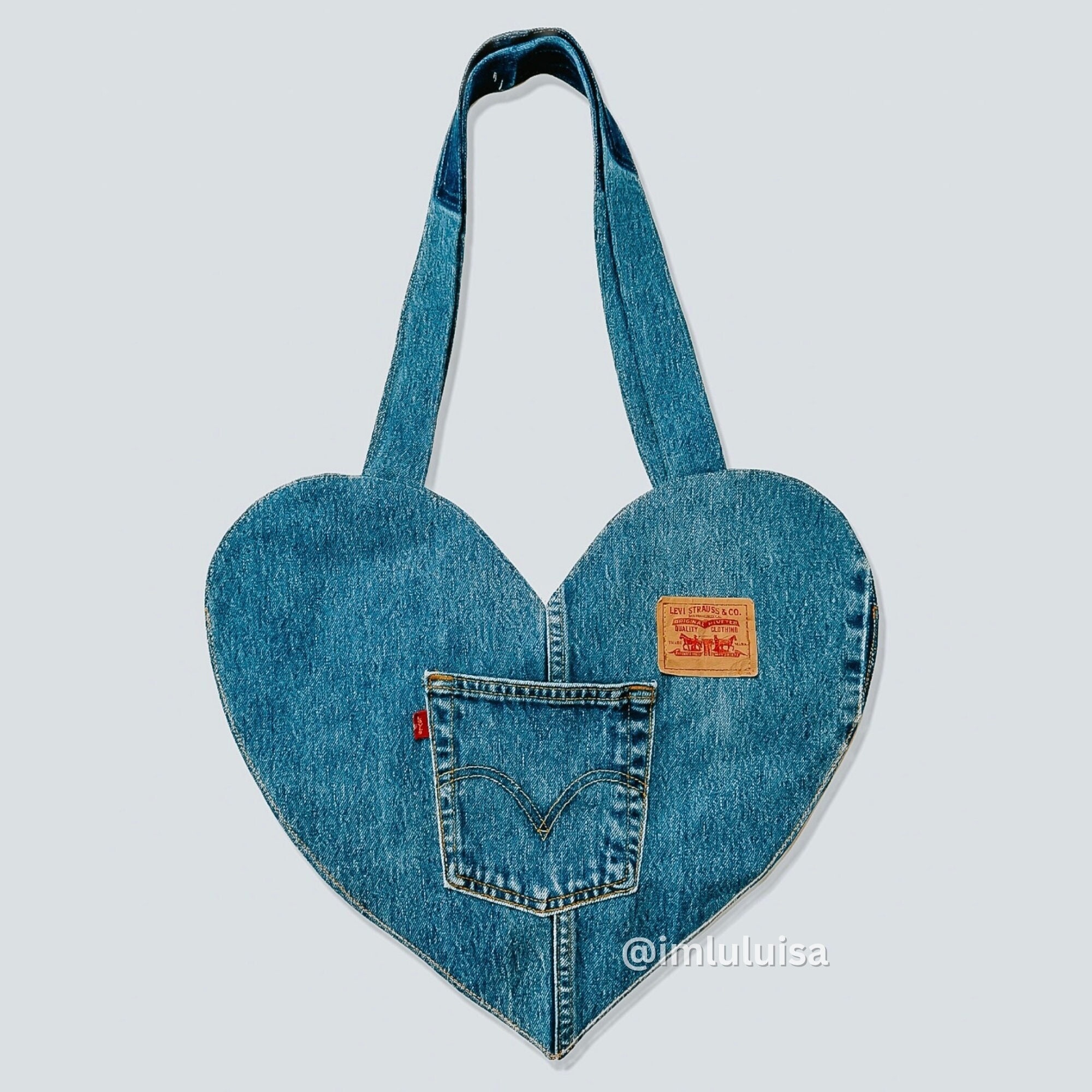 Heart shaped icon in air, made by plane Tote Bag for Sale by pixxart