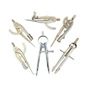 May include: A collection of five vintage metal drafting compasses and dividers. These technical drawing instruments feature various adjustable arms, pivot points, and locking mechanisms, all finished in a weathered silver-toned metallic material.