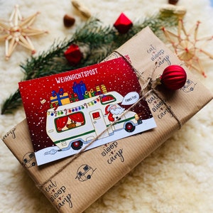 Weihnachtspostkarte Weihnachtsmann im Wohnmobil