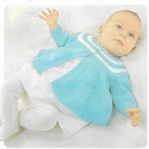 May include: A light blue knitted baby cardigan with white stripes around the neckline. The cardigan is open in the front and has long sleeves.