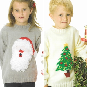 May include: Two children wearing knitted Christmas jumpers. The girl's jumper is grey with a white Santa Claus face and red hat. The boy's jumper is white with a green Christmas tree.