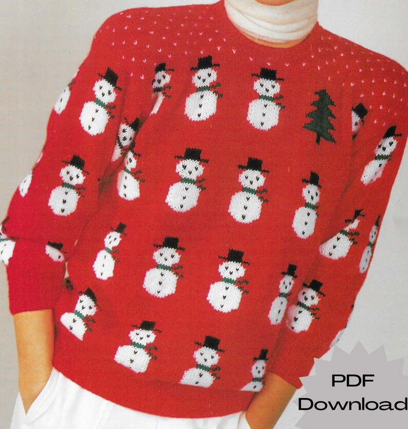 May include: Red knitted sweater with a pattern of white snowmen wearing black hats and green scarves. The sweater has a white dotted pattern on the shoulders and sleeves. The text "PDF Download" is visible in the lower right corner of the image.