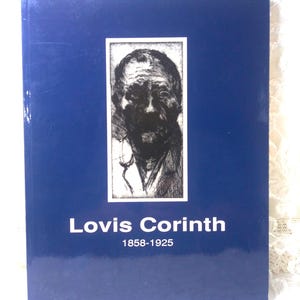 May include: A blue book with the title "Lovis Corinth" and the years "1858-1925" in white text. The cover features a black and white portrait of a man in a white framed box.
