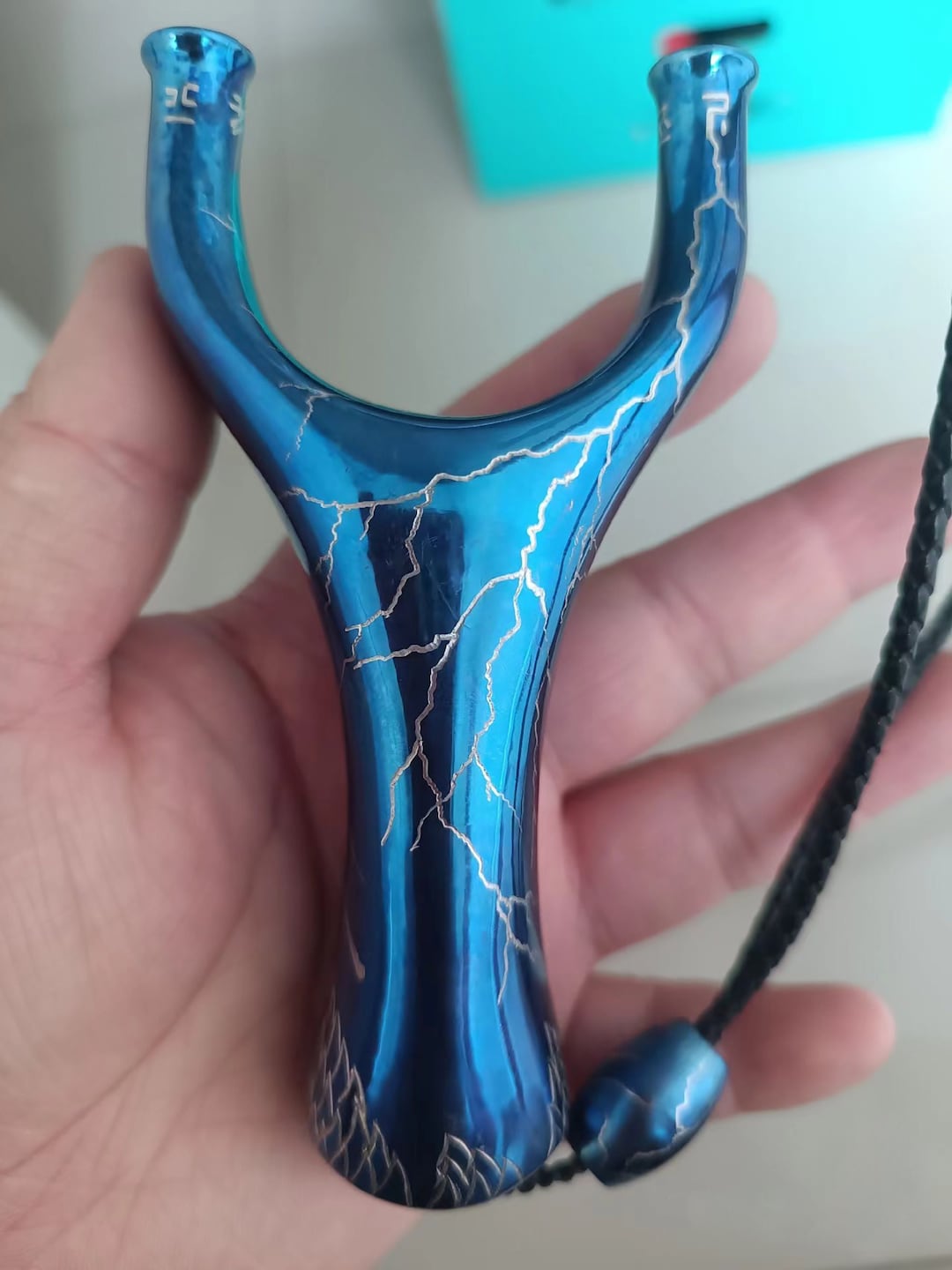 Titanium Slingshot. Roasted Blue Flying Tiger Slingshot. Lightning