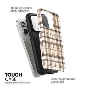 May include: A phone case with a plaid pattern in beige, brown, and white. The case is shown in layers, revealing a black protective silicone shock absorber and a 100% polycarbonate outer shell. The text "TOUGH CASE" and "Double Layer Protection" are visible.