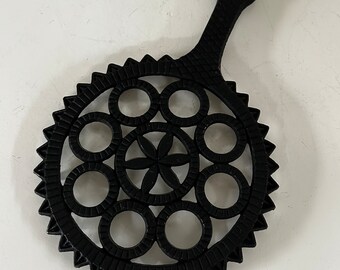 Vintage Black Sawtooth Edge Cast Iron Trivet