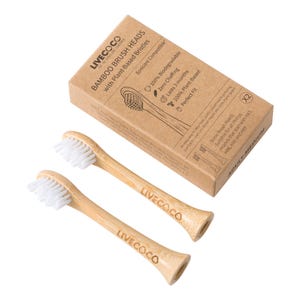 May include: Two bamboo toothbrush heads with white bristles. The packaging is brown and says "LIVECOCO Bamboo Brush Heads with Plant-Based Bristles Sonicare Compatible" and "X2".