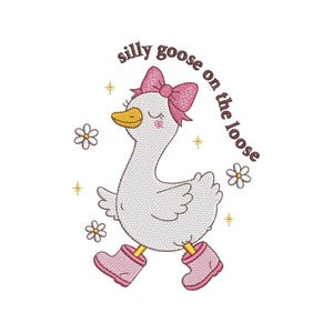 May include: Embroidered design of a white goose wearing a pink bow, pink boots, and a yellow beak. The text "silly goose on the loose" is arched above the goose. Daisies and stars are scattered around the goose.