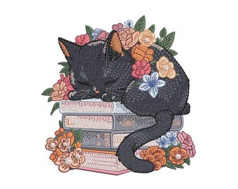 May include: A black cat with closed eyes sleeps on a stack of books. The cat is surrounded by colorful flowers.
