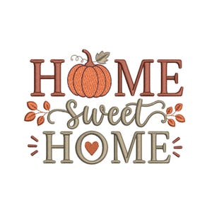 May include: An embroidery design featuring the text HOME SWEET HOME in brown and tan block and script lettering. An orange pumpkin with a green leaf sits above the word HOME, and small orange leaves and a heart accent the text.
