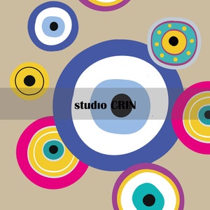 May include: A colourful abstract design featuring multiple blue, yellow, pink and turquoise evil eye charms with black pupils. The design is set against a beige background and includes the text "studio CRIN".