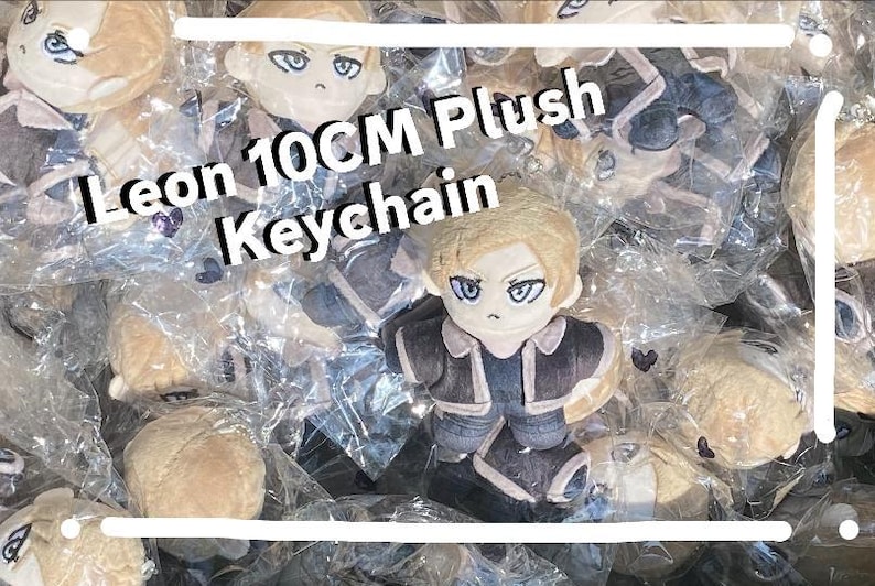 May include: A selection of Leon 10cm plush keychains. Each plush toy depicts a character with blonde hair, blue eyes, and a dark outfit. The keychains are packaged in clear plastic. Text on the image reads "Leon 10CM Plush Keychain."
