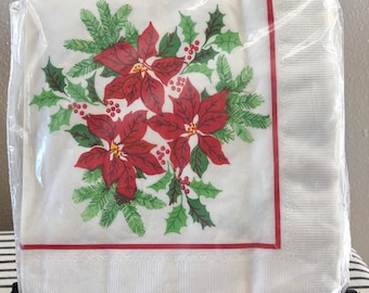 Vintage C.A. Reed Facial Tissue Christmas Paper Napkins in the original plastic.  44 count. Beautiful poinsettia print