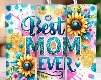 May include: A pink, blue, and yellow tumbler with a glitter design and the text "Best Mom Ever". The tumbler has a straw and is decorated with sunflowers and other floral elements.
