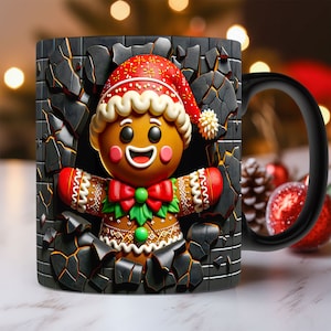 May include: A black ceramic mug with a gingerbread man design. The gingerbread man is wearing a red and white hat and is breaking through a cracked wall. The mug has a black handle.
