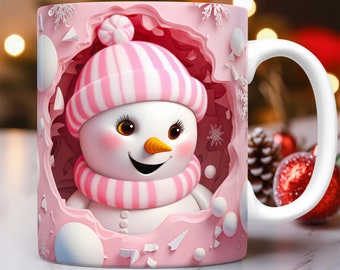May include: A pink ceramic mug with a 3D design of a snowman peeking out of a hole. The snowman is wearing a pink and white striped hat and scarf.