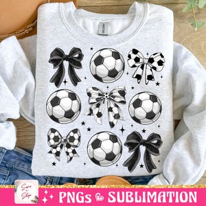 May include: A sublimation design featuring a grey sweatshirt with black and white footballs and bows. The design is perfect for creating custom apparel.