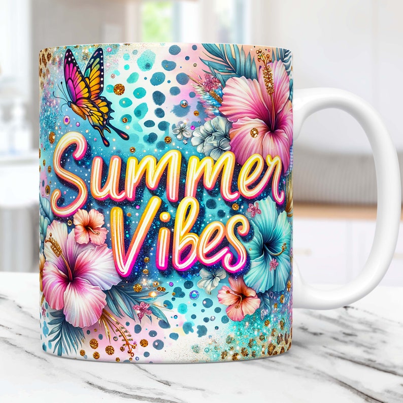 May include: White ceramic mug with a colorful design featuring tropical flowers, a butterfly, and the text "Summer Vibes".