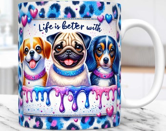 May include: White ceramic mug with a colorful design featuring three cartoon dogs and the text "Life is better with". The design includes a blue and pink leopard print background with hearts and dripping paint.