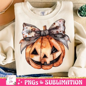 May include: A watercolor illustration of a pumpkin with a bow on top. The pumpkin is orange and has a carved jack-o'-lantern face. The bow is brown and white with a speckled pattern.