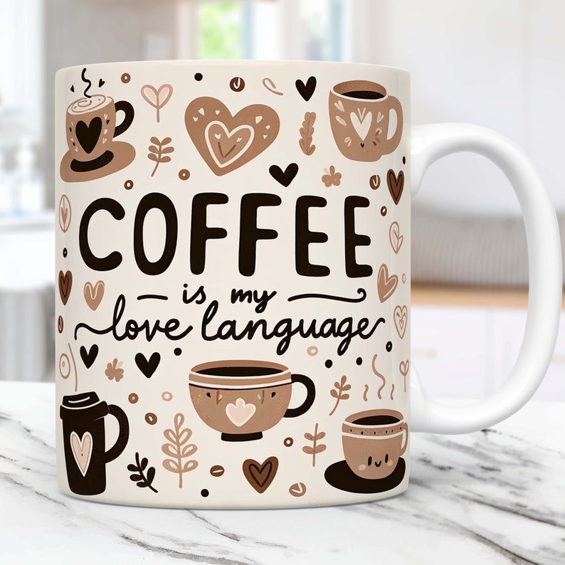May include: White ceramic coffee mug with a brown and black design. The mug features the text "COFFEE is my love language." and various coffee cup illustrations.