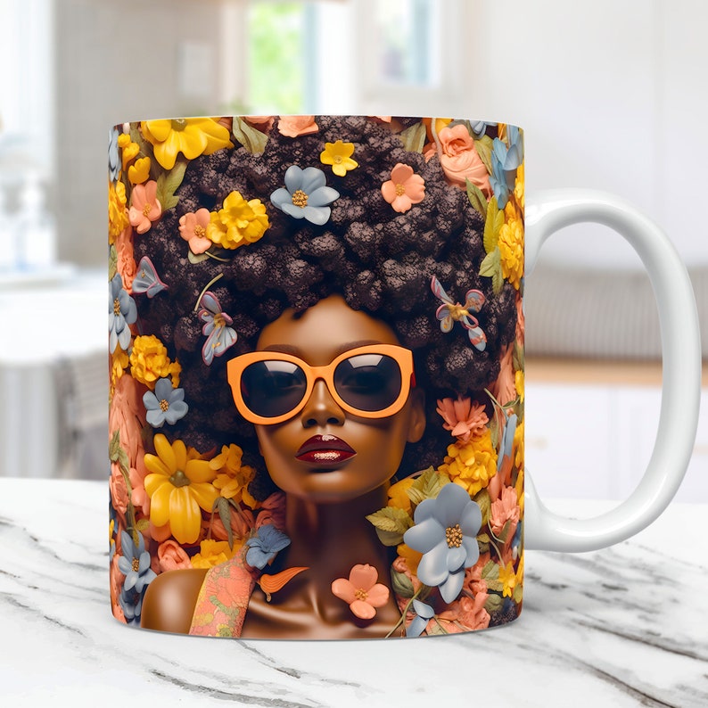 May include: White ceramic mug with a colorful image of a woman with an afro hairstyle wearing orange sunglasses and surrounded by yellow, blue, and pink flowers.