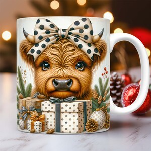 May include: A white ceramic mug with a brown and white Highland cow wearing a black and white polka dot bow. The mug is surrounded by Christmas-themed decorations, including pine branches, pine cones, and wrapped gifts with polka dot patterns.