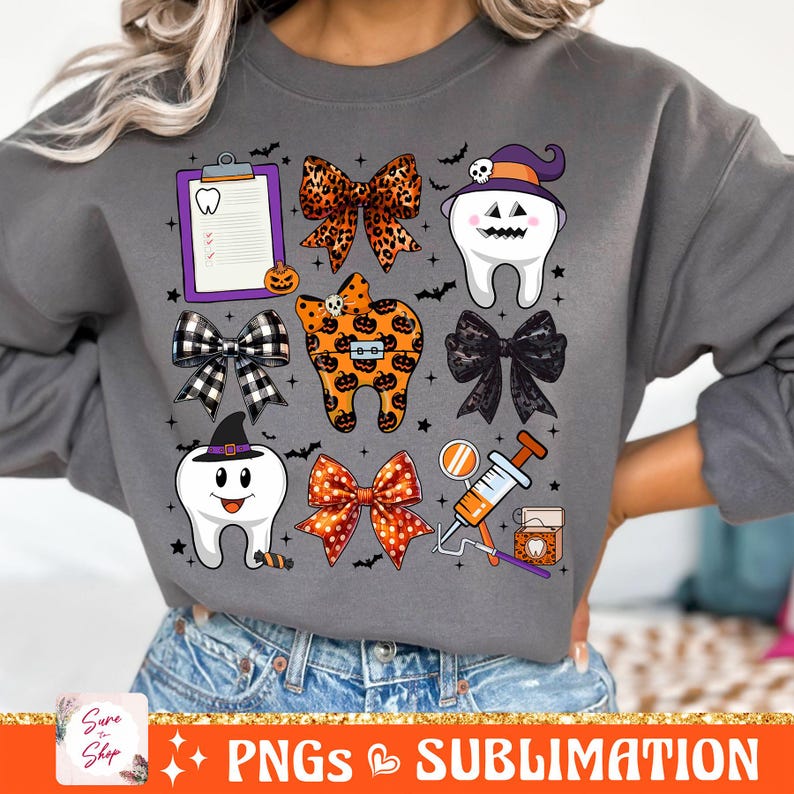 May include: A gray sweatshirt with a Halloween-themed design featuring cartoon teeth, bows, and pumpkins. The design includes a checklist with the words "Sure to Shop".