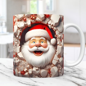 Puede incluir: Taza de cerámica blanca con un diseño navideño. La cara de Papá Noel asoma desde una pared agrietada, con un gorro rojo y una barba blanca.