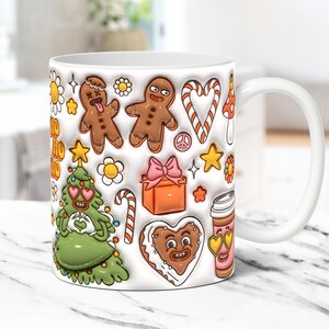 May include: White ceramic mug with a Christmas-themed design. The mug features gingerbread men, candy canes, a Christmas tree, a gift box, and a coffee cup. The design is in a cartoon style with bright colors.