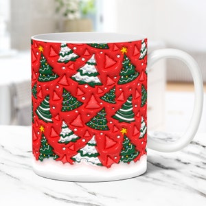 May include: White ceramic mug with a red background and a repeating pattern of green and white Christmas trees with yellow stars.