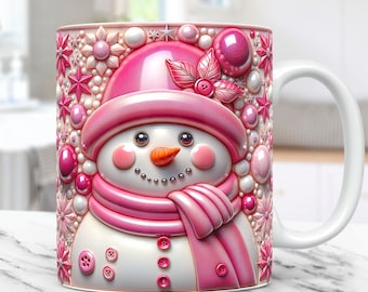 May include: A white ceramic mug with a pink snowman design. The snowman is wearing a pink hat and scarf and has a carrot nose. The mug is decorated with pink and white beads and stars.