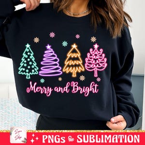 May include: Black sweatshirt with a design of four colorful neon Christmas trees and the text "Merry and Bright".