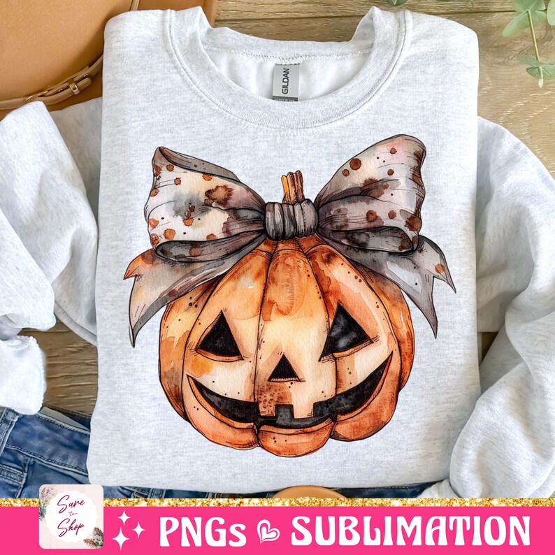 May include: A watercolor illustration of a jack-o'-lantern pumpkin with a brown and white polka dot bow. The pumpkin is orange with a black face and is on a gray background.