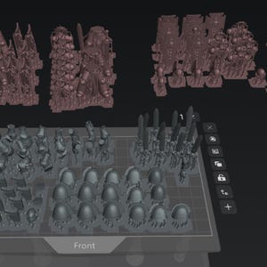 May include: A digital 3D modelling interface displaying a collection of miniature game figures arranged on a grid. The screen shows various grey-toned character parts, including helmets, weapons, and armour pieces, with the word Front visible.