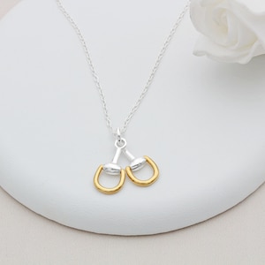 Halsband i sterlingsilver och 18 karat guld med vermeil-motiv