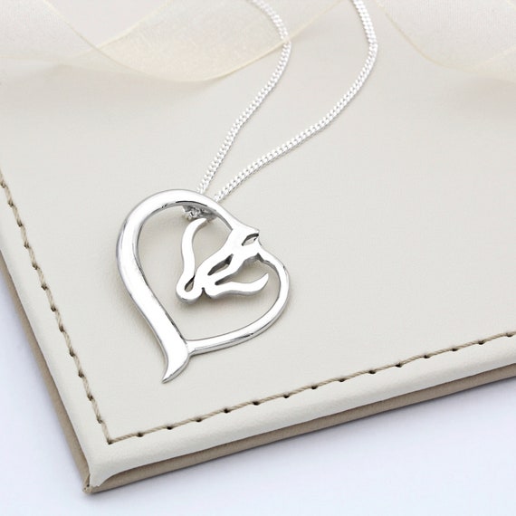 Sterling silver CZ mare & foal necklace. Sterling silver CZ mare & foal necklace.